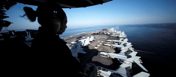 USS John C. Stennis makes its way to the Persian Gulf through the Strait of Hormuz USS John C. Stennis makes its way to the Persian Gulf through the Strait of Hormuz - Sputnik International