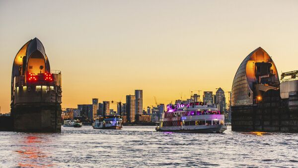 The boats travel through the Thames Barrier at sunset as the river plays host to an epic voyage through British music culture at Red Bull Music Odyssey in London, England - Sputnik International