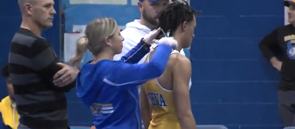 Teenaged wrestler forced to cut his dreadlocks prior to match after referee refuses to let him compete Teenaged wrestler forced to cut his dreadlocks prior to match after referee refuses to let him compete - Sputnik International