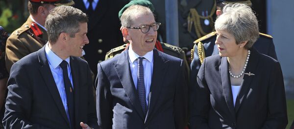 Secretary of State for Defence, Gavin Williamson, left, and Prime Minister Theresa May with her husband Philip, centre, during celebrations marking National Armed Forces Day in Llandudno, Wales, Saturday June 30, 2018. Secretary of State for Defence, Gavin Williamson, left, and Prime Minister Theresa May with her husband Philip, centre, during celebrations marking National Armed Forces Day in Llandudno, Wales, Saturday June 30, 2018. - Sputnik International