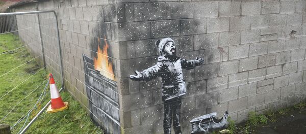Artwork by street artist Banksy, Thursday Dec. 20, 2018, which appeared on a garage wall in Taibach, Port Talbot, south Wales. Street artist and social commentator Banksy has apparently popped up in Wales, leaving a new artwork on a garage in Port Talbot that references the town's air pollution. - Sputnik International