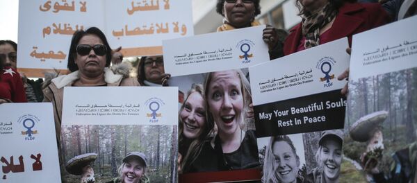 Moroccan women carry photos of 28-year-old Norwegian Maren Ueland and 24-year-old Danish Louisa Vesterager Jespersen, during a candlelight vigil outside the Danish embassy in Rabat for the two Scandinavian university students who were killed in a terrorist attack in a remote area of the Atlas Mountains, Morocco, Saturday, Dec. 22, 2018 Moroccan women carry photos of 28-year-old Norwegian Maren Ueland and 24-year-old Danish Louisa Vesterager Jespersen, during a candlelight vigil outside the Danish embassy in Rabat for the two Scandinavian university students who were killed in a terrorist attack in a remote area of the Atlas Mountains, Morocco, Saturday, Dec. 22, 2018 - Sputnik International