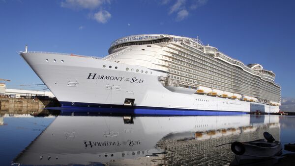 In this Feb. 18, 2016 file photo, the Harmony of the Seas docks at the STX Shipyard in Saint-Nazaire, western France. Tens of thousands of French well-wishers waved revoir to the largest cruise ship in the world as it set sail on its maiden voyage to the U.K. after 32 months in a French shipyard. - Sputnik International