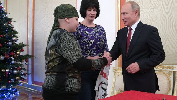 A very sick 10-year-old boy from the Russian southern region of Stavropol, whose dream it has been to shake hands with Russian President Vladimir Putin, was given a tour of the Kremlin on Thursday as part of a program that helps children in similar conditions. - Sputnik International