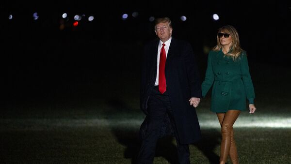 President Donald Trump and first lady Melania Trump arrive on the South Lawn of the White House after making a surprise visit to troops in Iraq, Thursday, Dec. 27, 2018, in Washington - Sputnik International