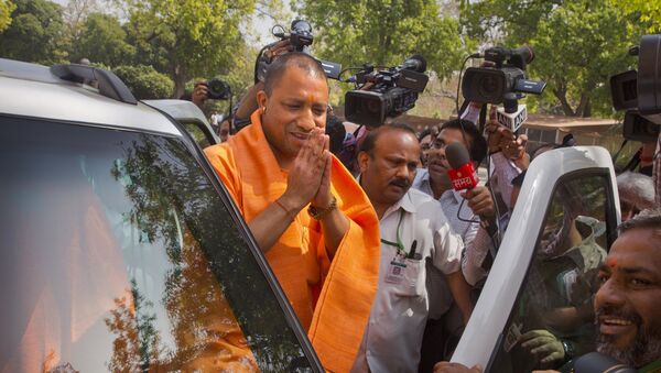 The new Chief Minister of the northern Indian state of Uttar Pradesh Yogi Adityanath greets media as he arrives at the Parliament in New Delhi, India, Tuesday, March 21, 2017 - Sputnik International
