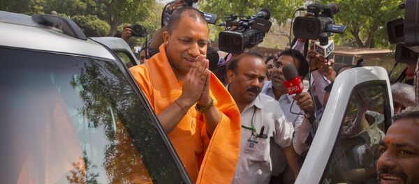 The new Chief Minister of the northern Indian state of Uttar Pradesh Yogi Adityanath greets media as he arrives at the Parliament in New Delhi, India, Tuesday, March 21, 2017 - Sputnik International