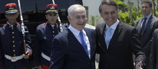 Israeli Prime Minister Benjamin Netanyahu, left center, is received by Brazil's President-elect Jair Bolsonaro at the military base Fort Copacabana, in Rio de Janeiro, Brazil, Friday, Dec. 28, 2018. - Sputnik International