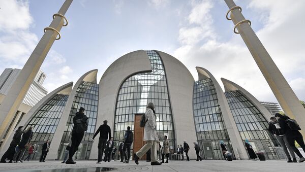FILE - In this Oct. 3, 2017 file photo people stand outside the new central DITIB mosque on the Day of Open Mosques in Cologne. The controversial new mosque by the organization of Turkish-Islamic Union for Religious Affairs is the largest mosque in Germany - Sputnik International