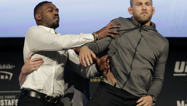 Jon Jones, left, pushes Alexander Gustafsson out of the way during a news conference about their light heavyweight bout, Friday, Nov. 2, 2018, at Madison Square Garden in New York. The two will fight in UFC 232, which is scheduled for Dec. 29, 2018, in Las Vegas. - Sputnik International
