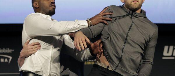 Jon Jones, left, pushes Alexander Gustafsson out of the way during a news conference about their light heavyweight bout, Friday, Nov. 2, 2018, at Madison Square Garden in New York. The two will fight in UFC 232, which is scheduled for Dec. 29, 2018, in Las Vegas. - Sputnik International