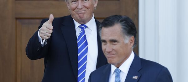 In this Nov. 19, 2016, file photo, shows President-elect Donald Trump giving the thumbs-up as Mitt Romney leaves Trump National Golf Club Bedminster in Bedminster, N.J. - Sputnik International