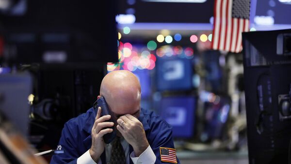 A trader talks on his phone on the floor of the New York Stock Exchange - Sputnik International