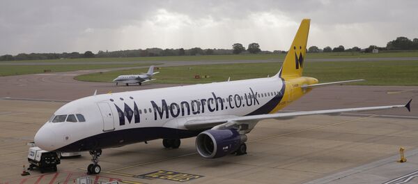 A Monarch Airlines plane, on the tarmac at Luton Airport in Luton, England A Monarch Airlines plane, on the tarmac at Luton Airport in Luton, England - Sputnik International