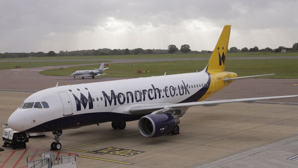 A Monarch Airlines plane, on the tarmac at Luton Airport in Luton, England - Sputnik International