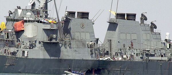 In Sunday, Oct. 15, 2000 file photo, experts in a speed boat examine the damaged hull of the USS Cole at the Yemeni port of Aden after a powerful explosion ripped a hole in the U.S Navy destroyer in the Yemeni port, killing 17 sailors and injuring some 30 others. A federal appeals court on Thursday, June 20, 2013 reinstated a lawsuit by the families of 17 sailors killed in the 2000 bombing of the USS Cole. A three-judge panel of the 4th U.S. Circuit Court of Appeals on Thursday reversed a lower court's dismissal of the lawsuit against Sudan. In Sunday, Oct. 15, 2000 file photo, experts in a speed boat examine the damaged hull of the USS Cole at the Yemeni port of Aden after a powerful explosion ripped a hole in the U.S Navy destroyer in the Yemeni port, killing 17 sailors and injuring some 30 others. A federal appeals court on Thursday, June 20, 2013 reinstated a lawsuit by the families of 17 sailors killed in the 2000 bombing of the USS Cole. A three-judge panel of the 4th U.S. Circuit Court of Appeals on Thursday reversed a lower court's dismissal of the lawsuit against Sudan. - Sputnik International