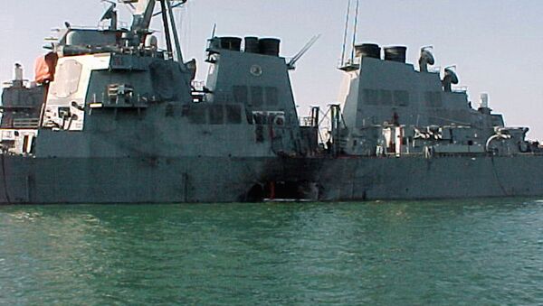 (FILES) This Handout file photo taken October 12, 2000 shows the port side of the guided missile destroyer USS Cole damaged after a suspected terrorist bomb exploded during a refueling operation in the port of Aden in Yemen. - Sputnik International