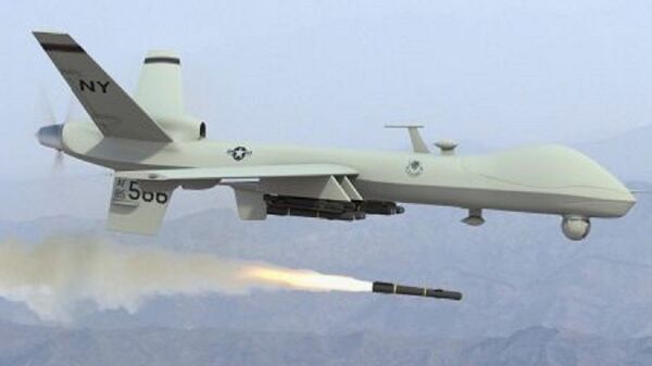 US predator drone unleashing the hellfire missile. This weapon deployed by the Central Intelligence Agency (CIA) and the Pentagon has killed thousands. The Obama administration has increased its usage in Africa, the Middle East and Central Asia. - Sputnik International