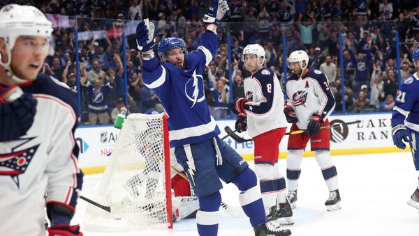 Jan 8, 2019; Tampa, FL, USA; Tampa Bay Lightning right wing Nikita Kucherov (86) celebrates after assisting on a goal by center Brayden Point (not pictured) against the Columbus Blue Jackets during the first period at Amalie Arena - Sputnik International