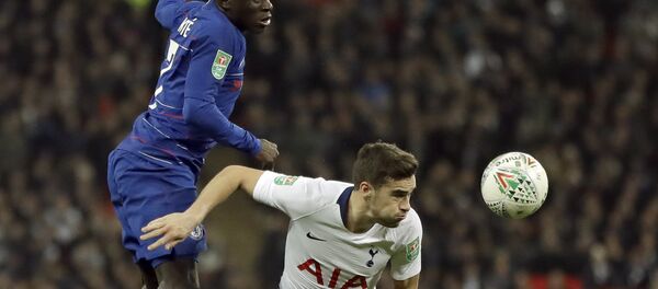 Tottenham's Harry Winks, right, and Chelsea's N'Golo Kante jump for the ball during the English League Cup semifinal first leg soccer match between Tottenham Hotspur and Chelsea at Wembley Stadium in London, Tuesday, Jan. 8, 2019 - Sputnik International
