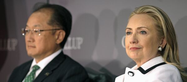 (File photo) World Bank President Jim Yong Kim, left, and Secretary of State Hillary Rodham Clinton wait to address the Gallup Evidence and Impact: Closing the Gender Data Gap conference in Washington, Thursday, July 19, 2012 (File photo) World Bank President Jim Yong Kim, left, and Secretary of State Hillary Rodham Clinton wait to address the Gallup Evidence and Impact: Closing the Gender Data Gap conference in Washington, Thursday, July 19, 2012 - Sputnik International