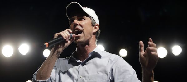 In this Nov. 5, 2018, file photo, Rep. Beto O'Rourke, D-El Paso, the 2018 Democratic candidate for U.S. Senate in Texas, speaks during a campaign rally in El Paso, Texas. Southern politics was a one-party affair for a long time. But now it’s a mixed bag with battlegrounds emerging in states with growing metro areas where white voters are more willing to back Democrats. In this Nov. 5, 2018, file photo, Rep. Beto O'Rourke, D-El Paso, the 2018 Democratic candidate for U.S. Senate in Texas, speaks during a campaign rally in El Paso, Texas. Southern politics was a one-party affair for a long time. But now it’s a mixed bag with battlegrounds emerging in states with growing metro areas where white voters are more willing to back Democrats. - Sputnik International