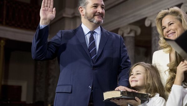 Vice President Mike Pence administers the Senate oath of office to Sen. Ted Cruz, R-Texas, accompanied by his wife Heidi and their daughter Catherine, during a mock swearing in ceremony in the Old Senate Chamber on Capitol Hill in Washington, Thursday, Jan. 3, 2019, as the 116th Congress begins. - Sputnik International