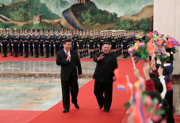 Chinese President Xi Jinping holds a welcoming ceremony for North Korean leader Kim Jong Un before their talks at the Great Hall of the People in Beijing, China January 8, 2019, in this picture released by Xinhua January 10, 2019. - Sputnik International