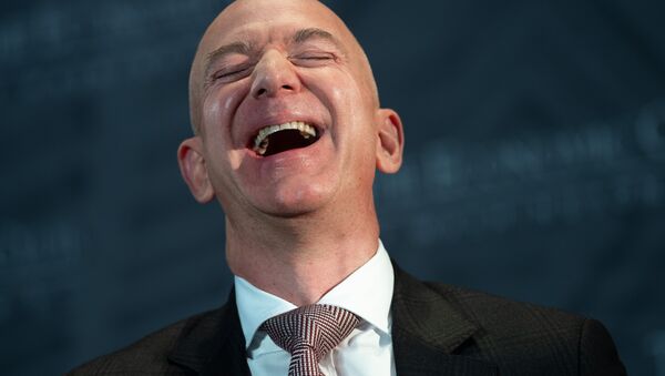 Jeff Bezos, founder and CEO of Amazon, laughs as he speaks during the Economic Club of Washington's Milestone Celebration event in Washington, DC, on September 13, 2018 - Sputnik International