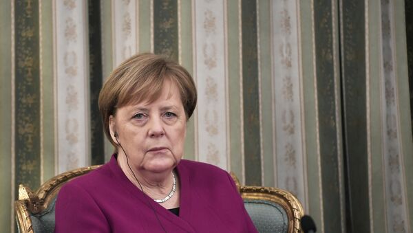 German Chancellor Angela Merkel listens to Greek President during a meeting in Athens on January 11, 2019 - Sputnik International