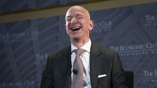 Jeff Bezos, Amazon founder and CEO, laughs as he speaks at The Economic Club of Washington's Milestone Celebration in Washington, Thursday, Sept. 13, 2018 - Sputnik International