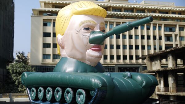 A giant inflatable US President Donald Trump tank sits outside an art exhibition in downtown Beirut, Lebanon, Thursday, Oct. 11, 2018 - Sputnik International