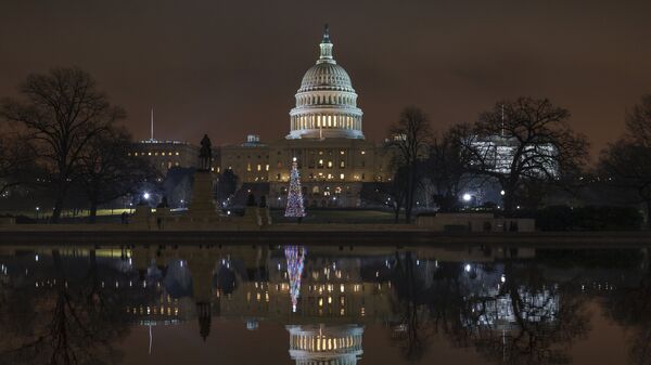 The US Capitol building is mirrored in the Reflecting Pool in Washington DC Dec. 28, 2018. - Sputnik International