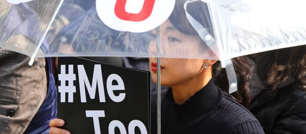 A South Korean demonstrator holds a banner during a rally to mark International Women's Day as part of the country's #MeToo movement in Seoul on March 8, 2018. A South Korean demonstrator holds a banner during a rally to mark International Women's Day as part of the country's #MeToo movement in Seoul on March 8, 2018. - Sputnik International
