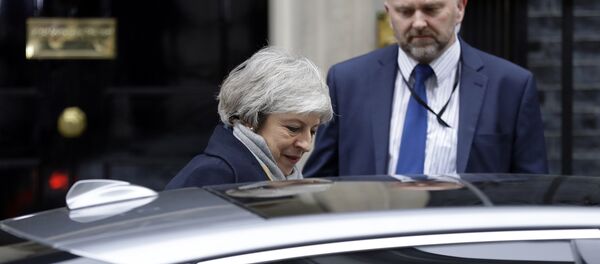 Britain's Prime Minister Theresa May leaves a cabinet meeting at Downing Street in London, Tuesday, Jan. 15, 2019. Britain's Prime Minister Theresa May leaves a cabinet meeting at Downing Street in London, Tuesday, Jan. 15, 2019. - Sputnik International
