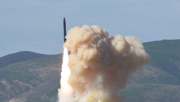 This photo provided by the Defense Department's Missile Defense Agency, taken Jan. 28, 2016, shows a long-range ground-based interceptor is launched from Vandenberg Air Force Base, Calif. - Sputnik International
