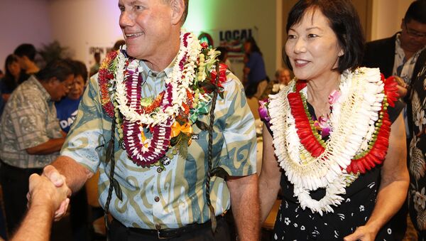 Rep. elect Ed Case, D-Hawaii, right, and his wife Audrey Nakamura Case, greet supporters Tuesday, Nov. 6, 2018, in Honolulu - Sputnik International