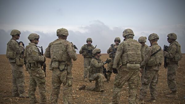 In this 7 November 2018 photo released by the US Army, US soldiers gather for a brief during a combined joint patrol rehearsal in Manbij, Syria - Sputnik International