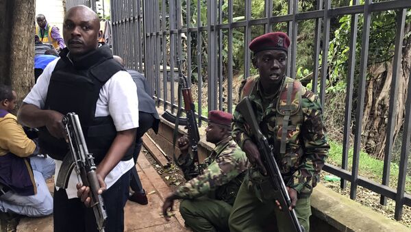 Security forces are seen at the scene of a blast in Nairobi, Tuesday, Jan. 15, 2019 - Sputnik International