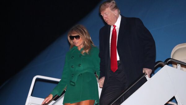 U.S. President Donald Trump and first lady Melania Trump arrive aboard Air Force One at the end of an unannounced visit with U.S. troops in Iraq, at Joint Base Andrews, Maryland, U.S. December 27, 2018 - Sputnik International