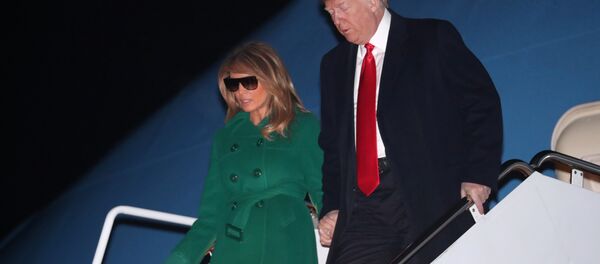 U.S. President Donald Trump and first lady Melania Trump arrive aboard Air Force One at the end of an unannounced visit with U.S. troops in Iraq, at Joint Base Andrews, Maryland, U.S. December 27, 2018 - Sputnik International