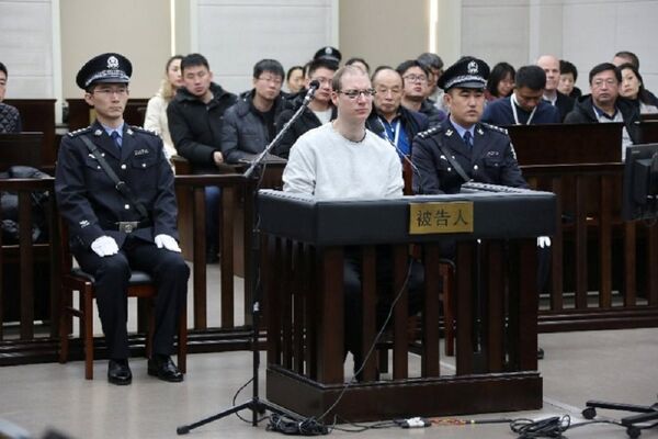 Canadian Robert Lloyd Schellenberg appears in court for a retrial of his drug smuggling case in Dalian, Liaoning province, China, January 14, 2019, in this handout picture received by Reuters January 15, 2019 Canadian Robert Lloyd Schellenberg appears in court for a retrial of his drug smuggling case in Dalian, Liaoning province, China, January 14, 2019, in this handout picture received by Reuters January 15, 2019 - Sputnik International