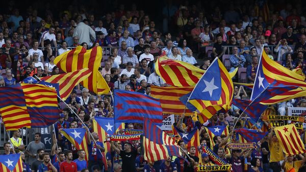 Barcelona fans cheer for their team before the group B Champions League soccer match between FC Barcelona and PSV Eindhoven at the Camp Nou stadium in Barcelona, Spain, Tuesday, Sept. 18, 2018 - Sputnik International