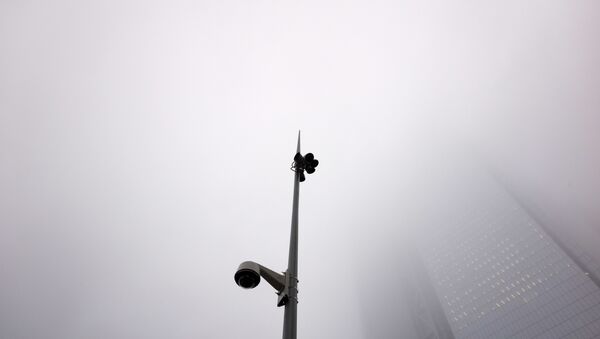 A fog hangs above a light pole with a surveillance camera at the World Trade Center, Tuesday, Feb. 20, 2018, in New York - Sputnik International