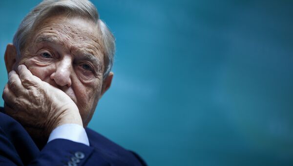 George Soros, Chairman of Soros Fund Management, listens during a seminar titled Charting A New Growth Path for the Euro Zone at the annual International Monetary Fund and World Bank meetings September 24, 2011 in Washington, DC. - Sputnik International