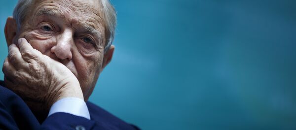 George Soros, Chairman of Soros Fund Management, listens during a seminar titled Charting A New Growth Path for the Euro Zone at the annual International Monetary Fund and World Bank meetings September 24, 2011 in Washington, DC. - Sputnik International
