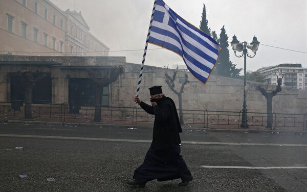 Participant of the protest in Athens - Sputnik International