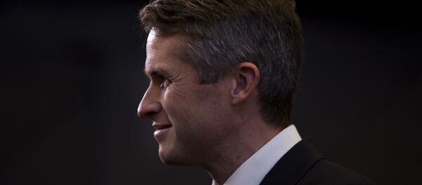 Britain's Defence Minister Gavin Williamson stands in the main chamber during the second day of a meeting of the North Atlantic Council at a gathering of NATO defence ministers at NATO headquarters in Brussels, Thursday, Oct. 4, 2018.  - Sputnik International
