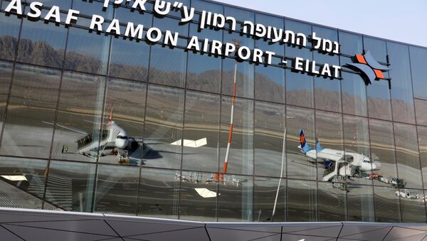 Planes are reflected in the facade of the Ramon International Airport after an inauguration ceremony for the new airport, just outside the southern Red Sea resort city of Eilat, Israel January 21, 2019. - Sputnik International