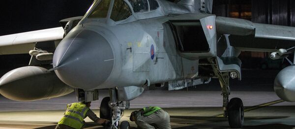 RAF Tornado taxis into its hangar after conducting strikes on 14 April 2018 in Syria RAF Tornado taxis into its hangar after conducting strikes on 14 April 2018 in Syria - Sputnik International